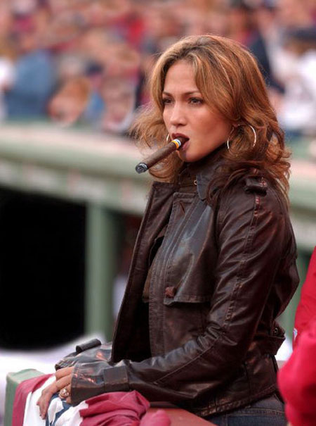 Jennifer Lopez smoking a cigar